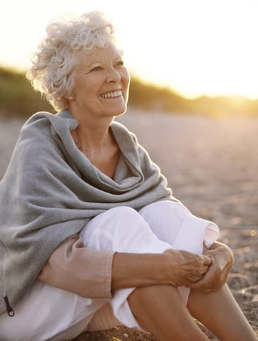 Old woman in a beach.